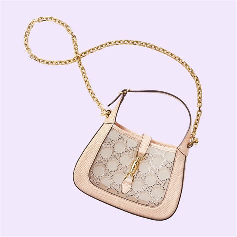 powder pink lizard bag.